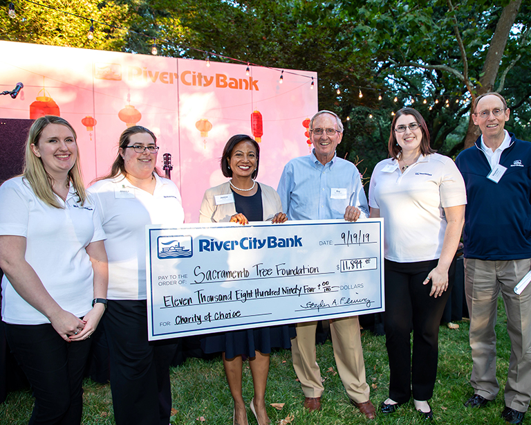 River City Bank presents check to the Sacramento Tree Foundation's Dr. Janine Bera and Ray Trethaway