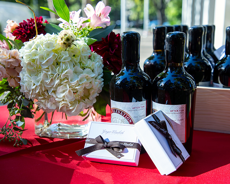 Flowers by Relles Florists and client gifts from Ginger Elizabeth and Elevation Ten