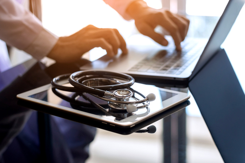 River City Bank's Riley Gardner with Randy Paragary